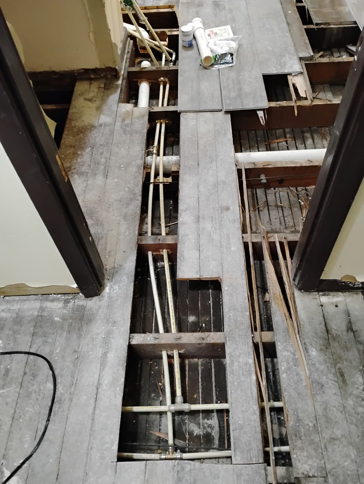 Toilet flange and supply lines set during rough-in